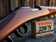 Detailed scene of a classic Winchester rifle and 32WIN ammo, highlighting heritage and precision for firearm enthusiasts.
