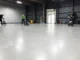 Expert team performing floor preparation Birmingham with diamond grinding and surface leveling